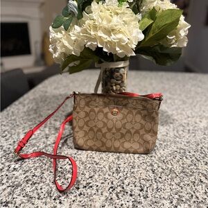 Coach Brown Crossbody Bag with Red Strap